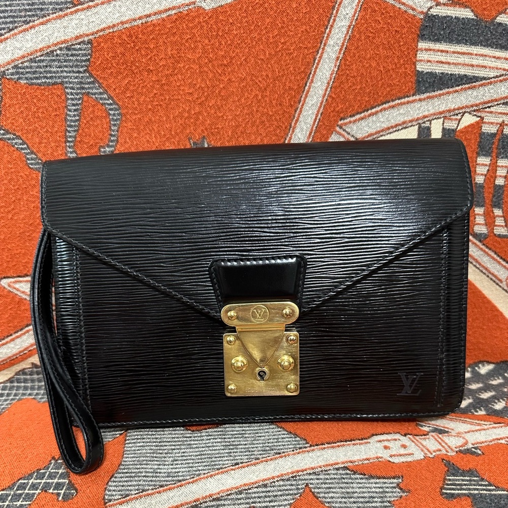 Louis Vuitton Black Clutch with Gold Accents